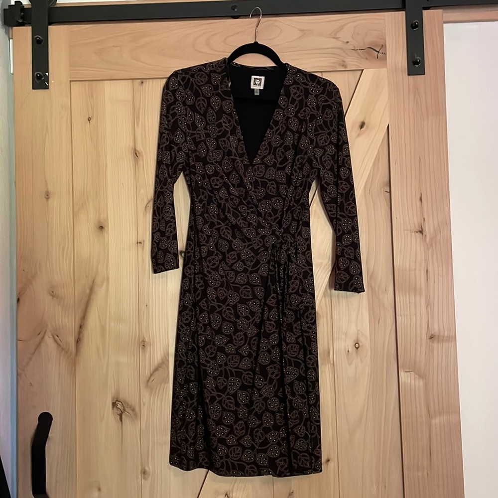 Anne Klein wrap dress with tie waist. Black with botanical leaf pattern